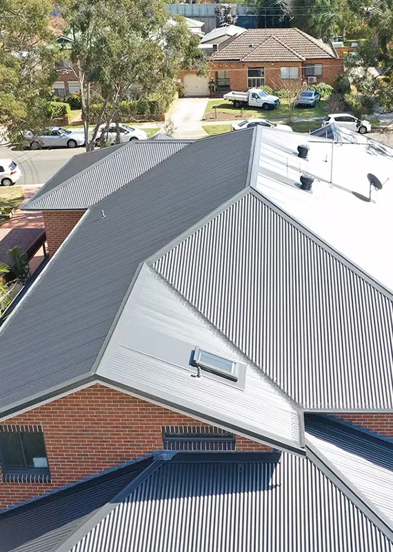 Aerial view of straight corrugated metal roofing on a suburban Sydney property
